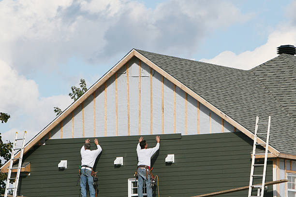 Professional Emergency Siding Repair technician working in Normalville, PA